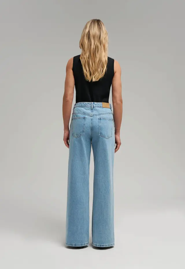 Джинсы Flared fit
