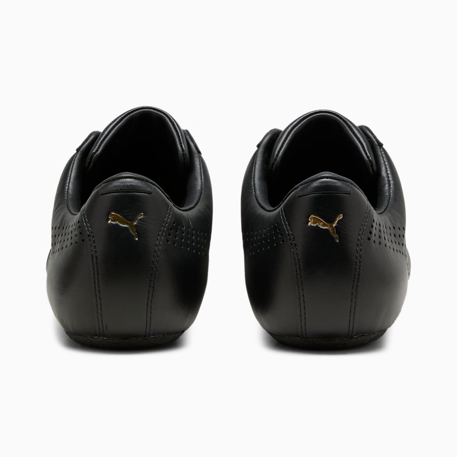 Пятки чёрных Speedcat с золотым логотипом PUMA